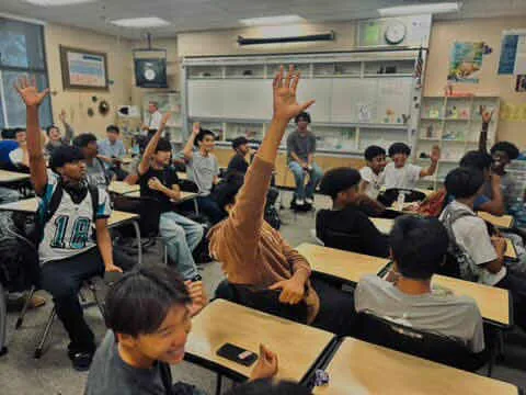 Students learning about engine systems in classroom session